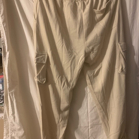 Cargo joggers in cream with drawstring elastic waist and ankles. New in bag. - Picture 8 of 9
